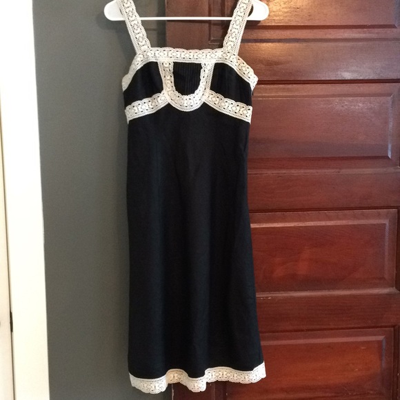 black dress with white lace trim